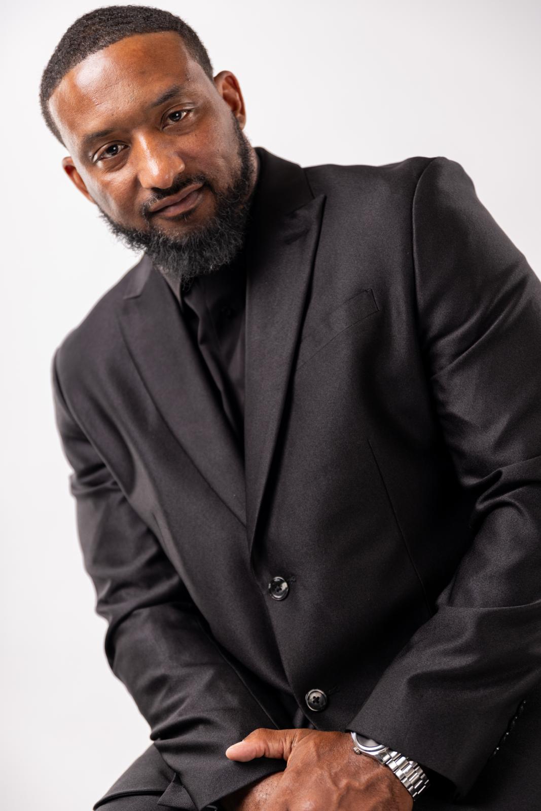 Mario Hall - Professional portrait in elegant black suit